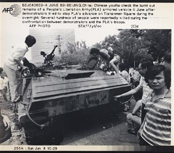 (CHINA) A group of 30 press photographs documenting the bloody culmination of the Tiananmen Square demonstrations in Beijing.